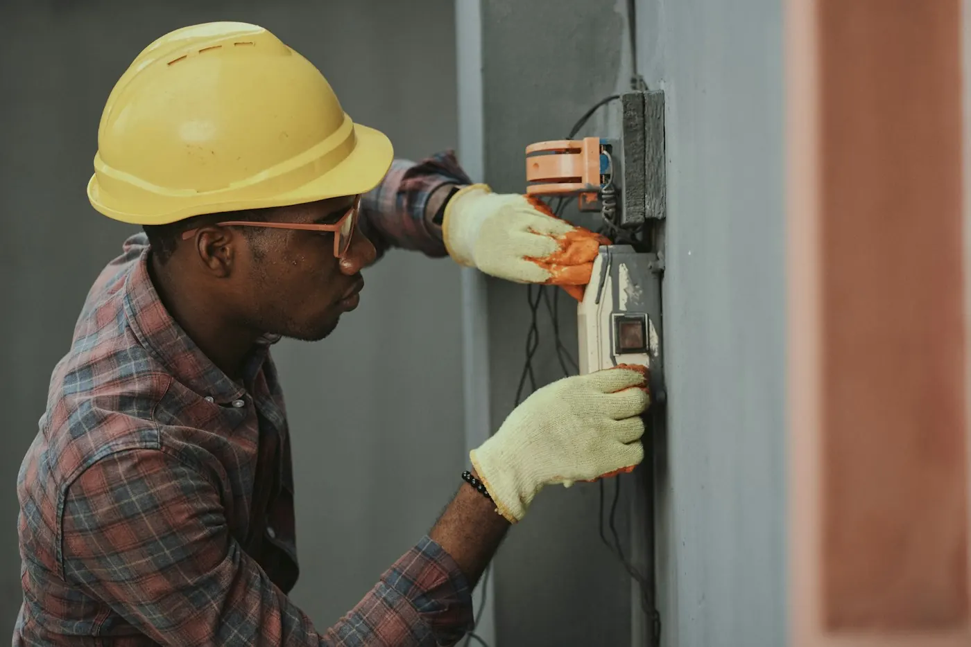 Electrician installing wiring